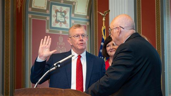 Ezell takes oath of office